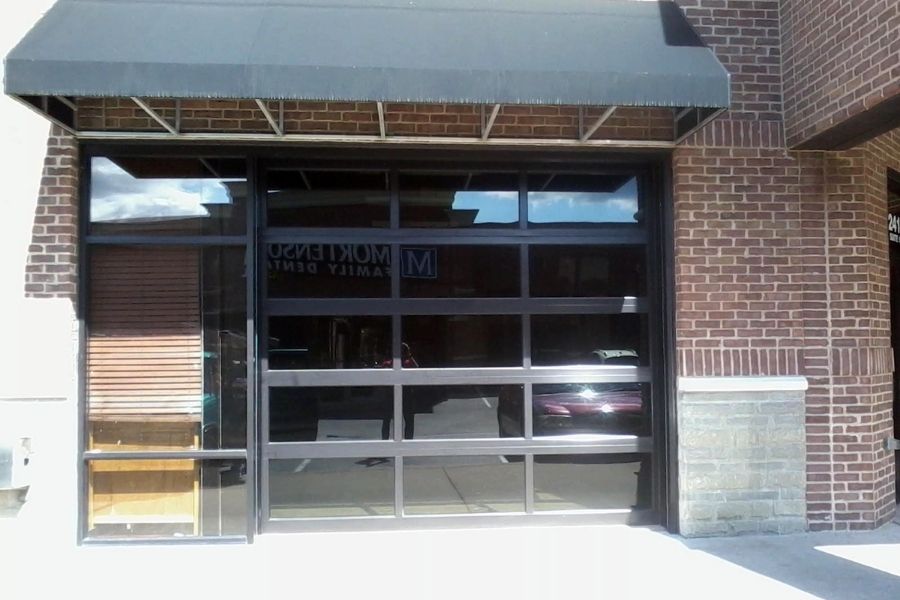 When a garage door emergency happens, it usually starts with one moment that changes everything—a loud, gunshot-like crack that echoes through the garage, a door stuck halfway, or a door that suddenly looks crooked enough that nobody wants to stand near it.