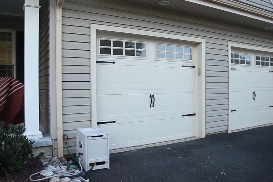 If your garage door suddenly feels heavier, starts making new noise, or stops partway through opening, it’s usually not just one part failing.
